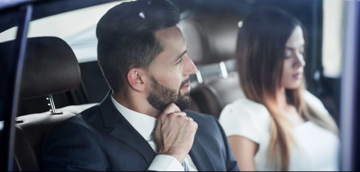 Business professionals using Transfeero corporate transportation services